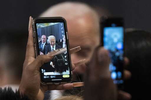 President Joe Biden is photographed by participants after delivering a speech commemorating Martin …