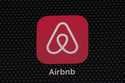 The Airbnb app icon is seen on an iPad screen on May 8, 2021, in Washington