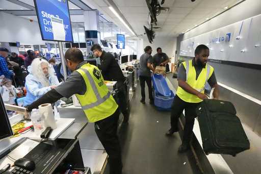 Passenger drop off their baggage at United Airlines in C Terminal at George Bush Intercontinental A…