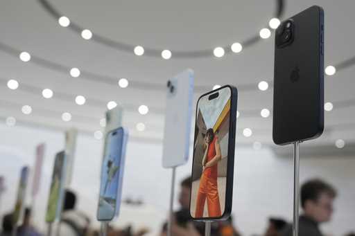 iPhone 15 phones are shown during an announcement of new products on the Apple campus in Cupertino,…