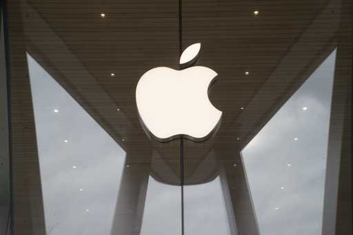 The Apple logo is displayed at an Apple store, January 3, 2019
