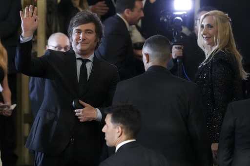 Argentina's newly sworn-in President Javier Milei, left, and his sister Karina arrive to the Colon …