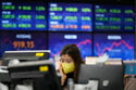 Asian shares decline amid omicron, Fed, Ukraine jitters