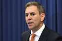 Australia's Federal Treasurer Jim Chalmers speaks to the media during a news conference in Brisbane…
