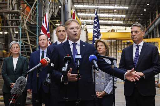 BritainÅfs Secretary of State for Defence Grant Shapps, center, speaks to media as Premier of South…