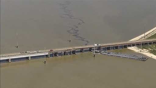 Oil spills into the surrounding waters after a barge hit a bridge in Galveston, Texas, on Wednesday…