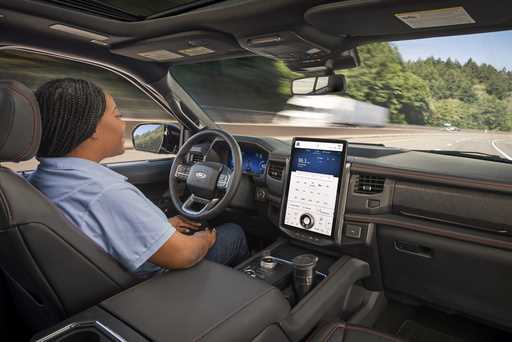 This photo provided by Ford shows the BlueCruise driver system, which gives the driver the option t…