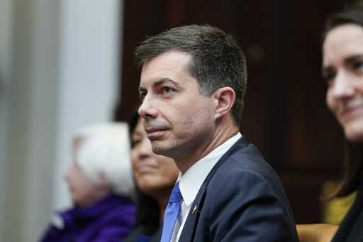 Transportation Secretary Pete Buttigieg attends a meeting with President Joe Biden's 