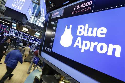 FILE- The Blue Apron logo appears above a trading post on the floor of the New York Stock Exchange,…