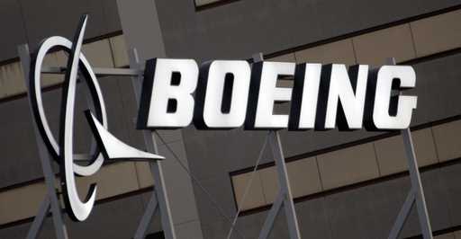 The Boeing logo is seen, January 25, 2011, on the property in El Segundo, Calif