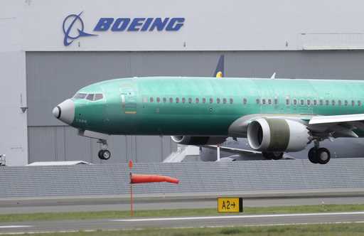 In this April 10, 2019, file photo, a Boeing 737 Max 8 airplane lands following a test flight at Bo…