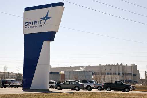 The Spirit AeroSystems sign is seen, July 25, 2013, in Wichita, Kan