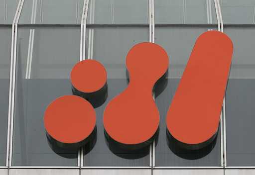 Mining giant BHP Billiton logo sits on the outside of their head office in Melbourne, Australia, Th…