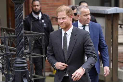 Britain's Prince Harry leaves the Royal Courts Of Justice in London, Thursday, March 30, 2023