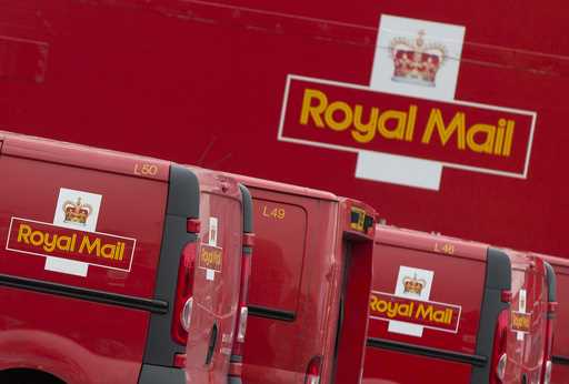 Royal Mail vans line up at London's largest sorting office, Mount Pleasant, Sept