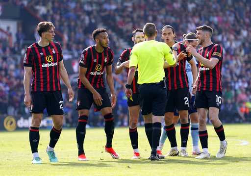 Bournemouth players appeal to referee Matt Donohue after he awards a penalty to Brentford A VAR che…