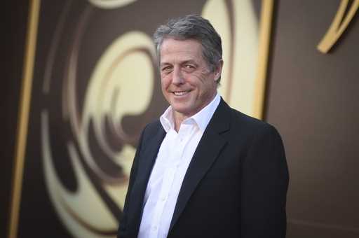 Hugh Grant arrives at the premiere of 