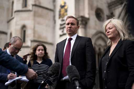 Financial market trader Tom Hayes speaks to the media, with his lawyer Karen Todner, right, outside…