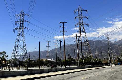 Electrical grid towers are seen during a heat wave where temperature reached 105 degrees Fahrenheit…
