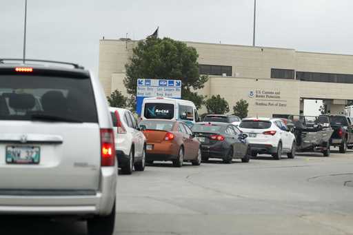 Traffic backs up at the border crossing from Manitoba, Canada, to the U