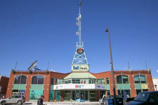 A person walks by the CTV Television Network studios in Ottawa, Quebec, Canada, on Monday, February…