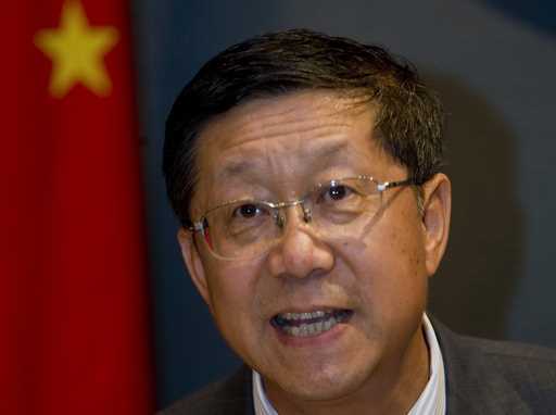 Tang Shuangning, then chairman of China Everbright Group and Everbright Securities Co