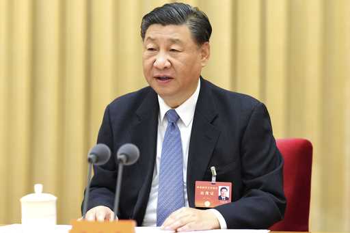 In this photo released on December 12, 2023 by Xinhua News Agency, Chinese President Xi Jinping lea…