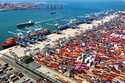 An aerial view of a container port is seen in Qingdao in east China's Shandong province, on June 6,…