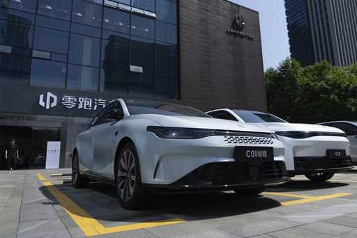Leapmotor vehicles are parked outside a showroom in Hangzhou in eastern China's Zhejiang province o…