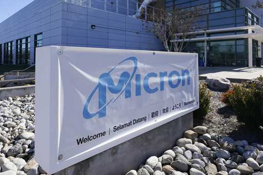 A sign marks the entrance of the Micron Technology automotive chip manufacturing plant on February …