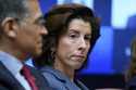 Commerce Secretary Gina Raimondo listens during a meeting with President Joe Biden's 