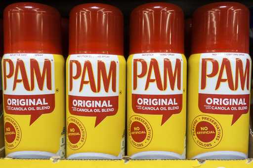 Cans of PAM cooking spray, a Conagra brand, rest on a supermarket shelf in Cincinnati, June 25, 201…