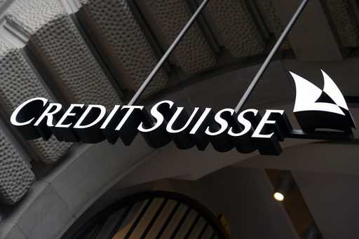 The logo of the Swiss bank Credit Suisse is seen on a building in Zurich, Switzerland, October 21, …