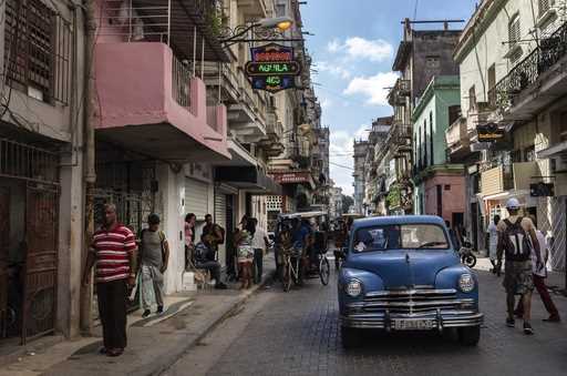 An American classic car makes its way down a street in Havana, Cuba, November 11, 2023