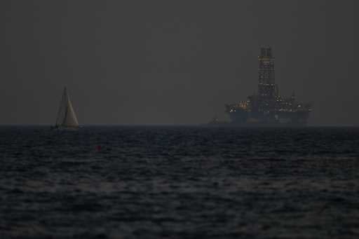 An offshore drilling rig is seen in the waters off Cyprus' coastal city of Limassol, on July 5, 202…
