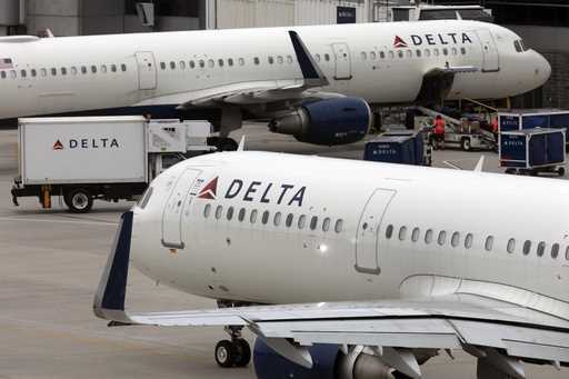 A Delta Air Lines plane leaves the gate on July 12, 2021, at Logan International Airport in Boston