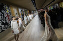 Dior celebrates couture craft, as maskless Delevingne irks