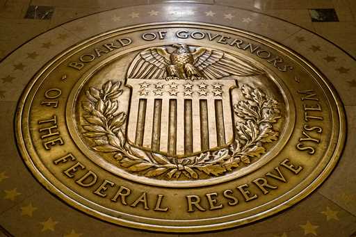 The seal of the Board of Governors of the United States Federal Reserve System is displayed in the …