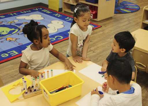 Children color at the KinderCare Child Development center on April 18, 2024, in Las Vegas