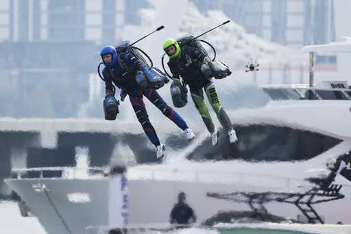Jet suit pilots race in Dubai, United Arab Emirates, Wednesday, February 28, 2024