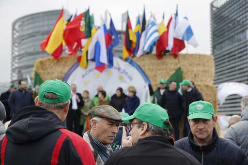 Farmers gather Tuesday, March 12, 2024 outside the European Parliament in Strasbourg, eastern Franc…