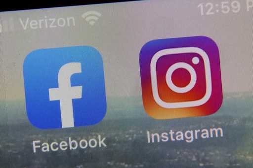This photo shows the mobile phone app logos for, from left, Facebook and Instagram in New York, Oct…