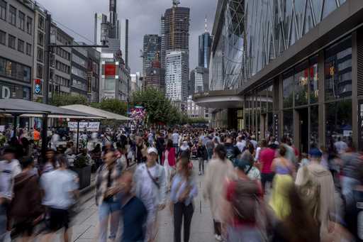 People walk in the main shopping street 'Zeil' in central Frankfurt, Germany, Saturday, August 5, 2…