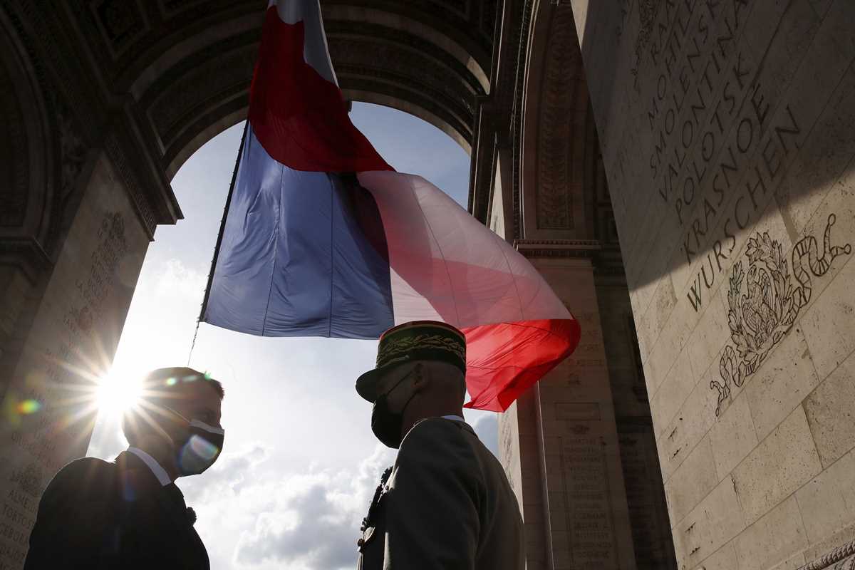 Ceremony to mark the end of World War II at the Arc de Triomphe in Paris