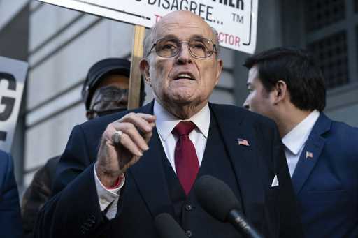 Former Mayor of New York Rudy Giuliani speaks during a news conference outside the federal courthou…