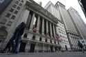 Traders work on the floor at the New York Stock Exchange in New York, Monday, March 13, 2023