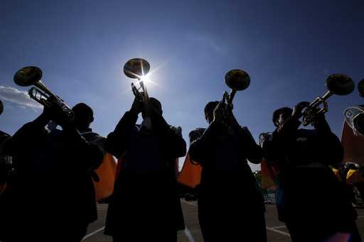 File - The Southern University Human Jukebox marching band warms up before the 2023 National Battle…