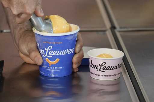 Ben Van Leeuwen scoops Kraft Mac & Cheese flavored ice cream Wednesday, May 15, 2024, in the Brookl…