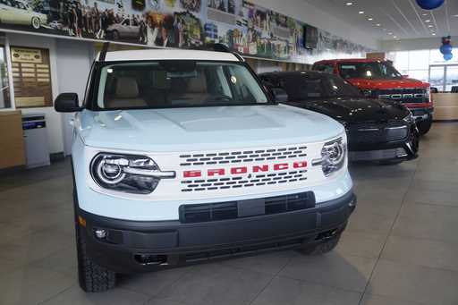 FILE -A Ford Bronco is displayed at a Gus Machado Ford dealership on January 23, 2023, in Hialeah, …