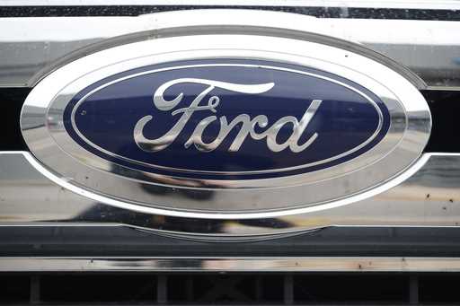 The Ford company logo is pictured, October 20, 2019, at a Ford dealership in Littleton, Colo